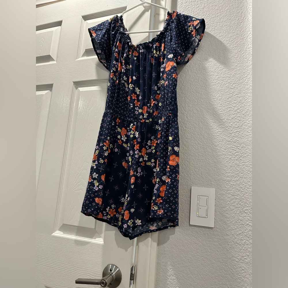 Multicolored flower romper! Stretchy neck line for multi-look wear!